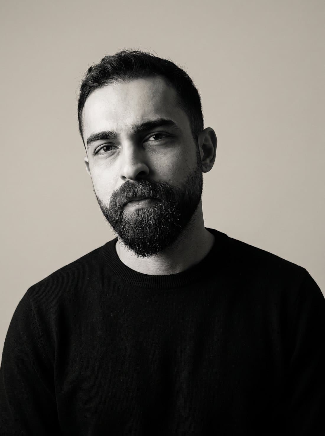 Black and white portrait of Uygar Eren Kurt